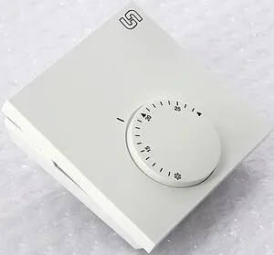 Проводной комнатный терморегулятор НЗ 230В Uni-fitt белый 340M1000, 2