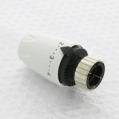 Головка термостатическая Uni-Fitt DX белый 169D1000