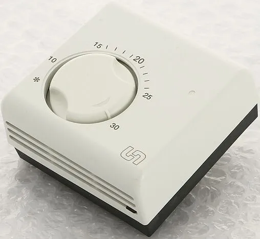 Проводной комнатный терморегулятор НО/НЗ 230В Uni-fitt TA5 белый 331I2000